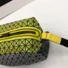 Picture of Issey Miyake Size: 26/15/11cm Grey with yellow