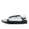 Picture of SACAI X NIKE LVD WAFFLE PAPRA/NONOISE X RUNNING SHOES